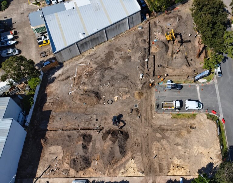 Aerial view of screw pile installation works at the Hub on Meta industrial development in Caringbah